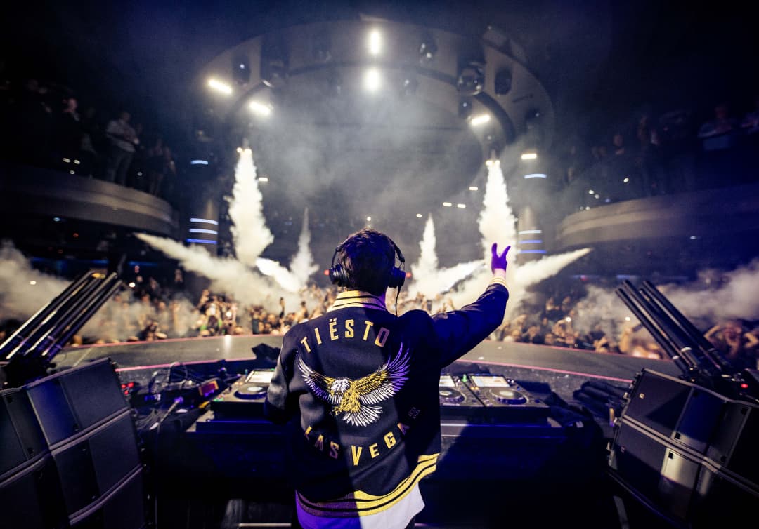 Back of Tiesto's set up in a crowded night club